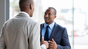 African business leader mentoring another professional