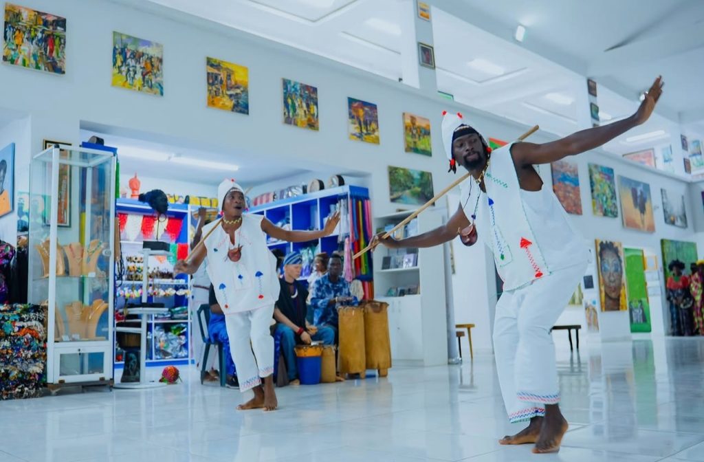 African dancers performing in an art gallery